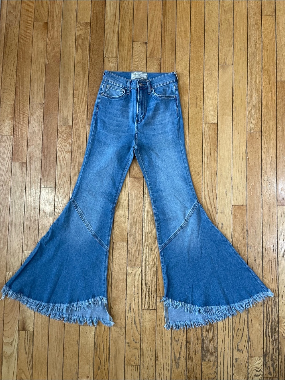 Free People Blue High-Rise Flare Jeans with Frayed Hem